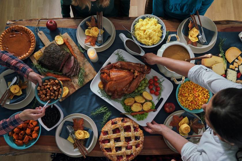 aerial view of thanksgiving table full of food